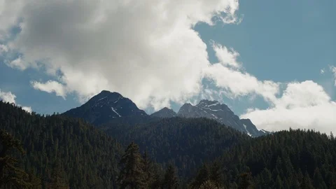 Clouds wrapping around mountains in North Cascades National Park Stock Footage 91337980