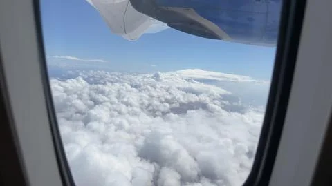 Cloudscape from airplane window view Stock Photos
