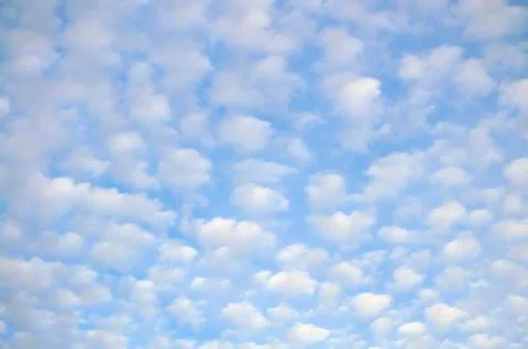 Cloudscape with altocumulus clouds at sunny day Stock Photos