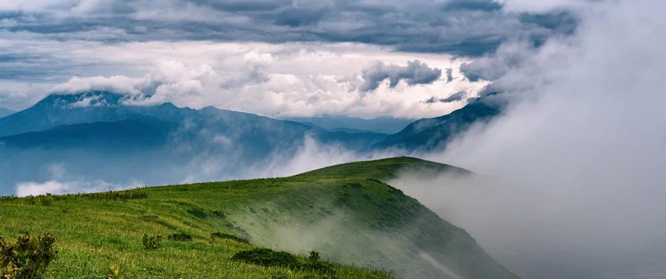 Cloudscape and mountain range. 스톡 사진