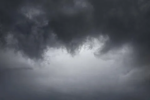 Cloudscape background of dark stormy clouds Stock Photos