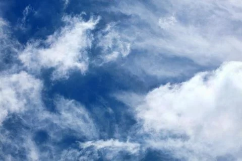 Cloudscape background of dramatic cirrus and cumulus clouds Stock Photos