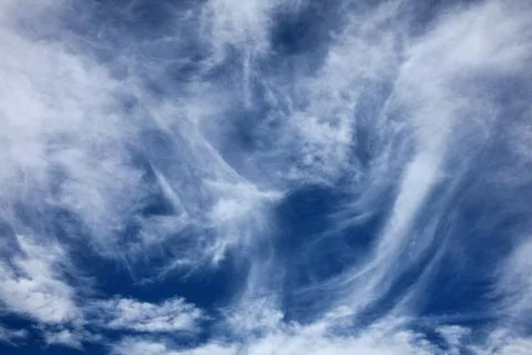 Cloudscape background texture of dramatic cirrus clouds Stock Photos