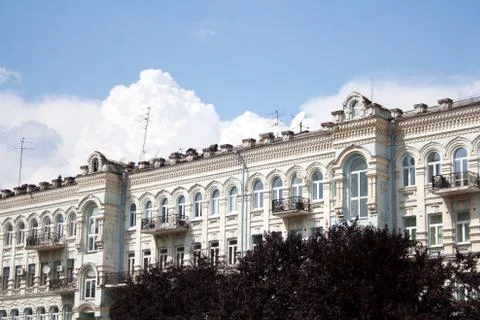 Cloudscape behind the building Stock Photos
