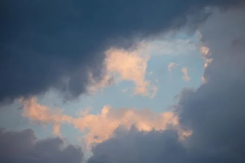 Cloudscape with blue sky after a summer storm Stock Photos