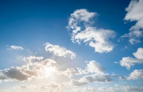 Cloudscape with blue sky and sun for backgrounds Foto stock