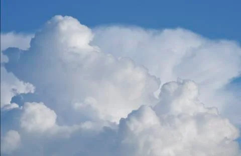 Cloudscape. Blue sky and white cloud. Sunny day Stock Photos