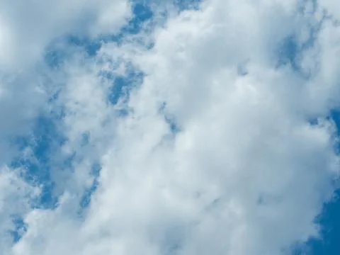 Cloudscape. Blue sky and white cloud. Sunny day. Cumulus cloud. Stock Photos