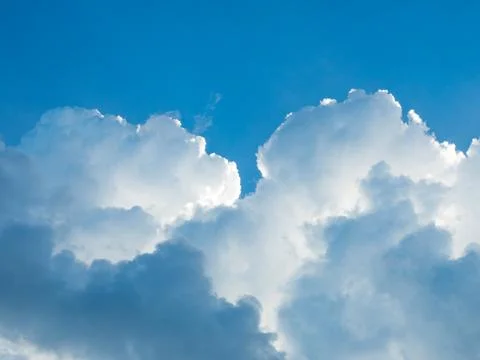 Cloudscape. Blue sky and white cloud. Sunny day. Cumulus cloud. Stock Photos