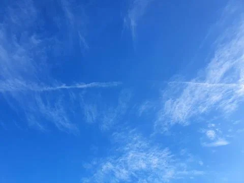 Cloudscape with blue sky and white clouds Stock Photos