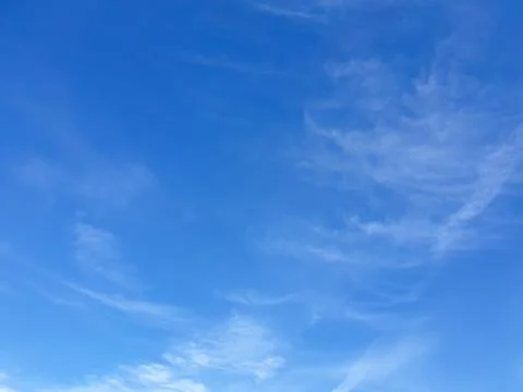 Cloudscape with blue sky and white clouds Stock Photos