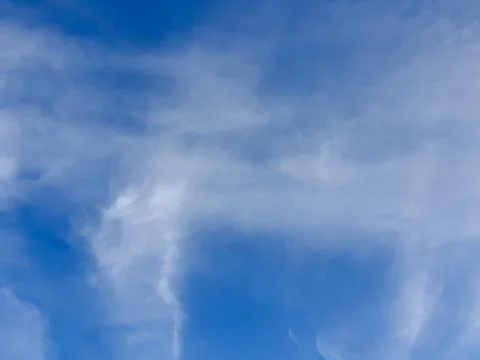 Cloudscape with blue sky and white clouds Stock Photos