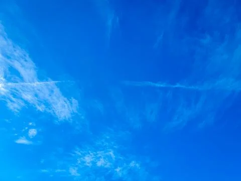 Cloudscape with blue sky and white clouds Stock Photos