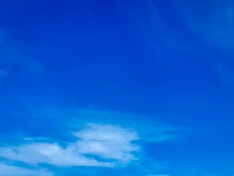 Cloudscape with blue sky and white clouds Stock Photos