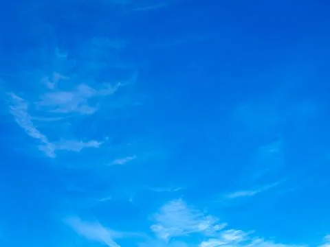 Cloudscape with blue sky and white clouds Stock Photos