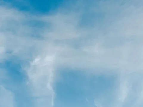 Cloudscape with blue sky and white clouds Stock Photos