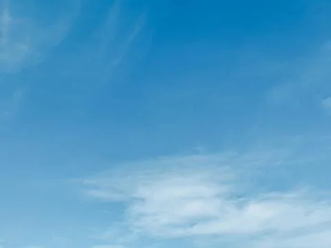 Cloudscape with blue sky and white clouds Stock Photos