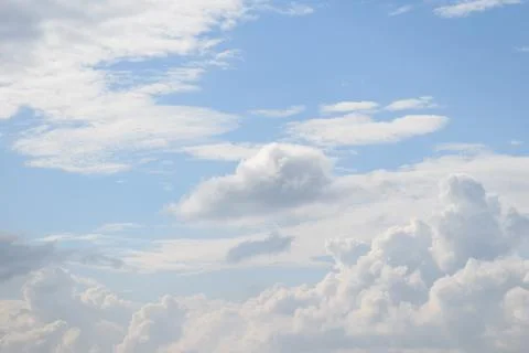 Cloudscape with blue sky and white clouds Stock Photos