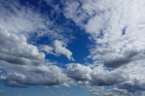 Cloudscape. Blue sky and white clouds Stock Photos