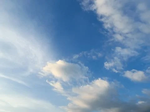 Cloudscape with Blue Sky and White Clouds Фото