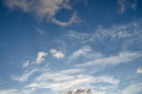 Cloudscape with Cirrus and Cumulus Clouds in Blue Sky Stockfoto's