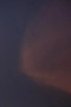 Cloudscape, Colored Clouds at Sunset near the Ocean Foto stock