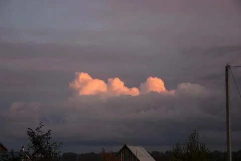 Cloudscape, Colored Clouds at Sunset near the Nikulino village Stock Photos