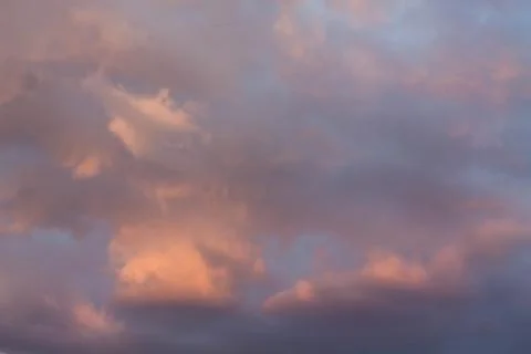 Cloudscape, Colored Clouds at Sunset near the Ocean, Background Stock Photos