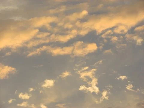 Cloudscape, Colored Clouds at Sunset near the Ocean in a Tropical Climate Stock Photos