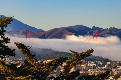 Cloudscape covering the Golden Gate Bridge in California Stock Photos