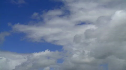 Cloudscape - Fluffy White Rain Clouds Gathering in Blue Sky Stock Footage