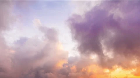 Cloudscape fly-through time-lapse from dawn to sunrise Stock Footage 56162366