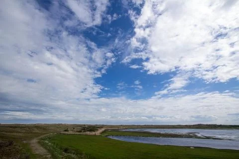 Cloudscape on the island Texel in the Netherlands Stock Photos