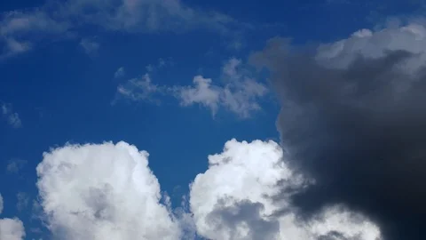 Cloudscape with large, building through cloud mass. Video stock 88330705