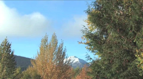 Cloudscape with mountain peak in background Video stock 290652