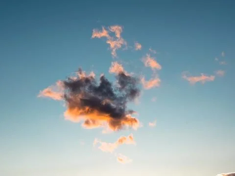 Cloudscape with Orange Clouds in Blue Sky 스톡 사진