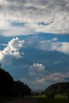 Cloudscape over the city Stock Photos