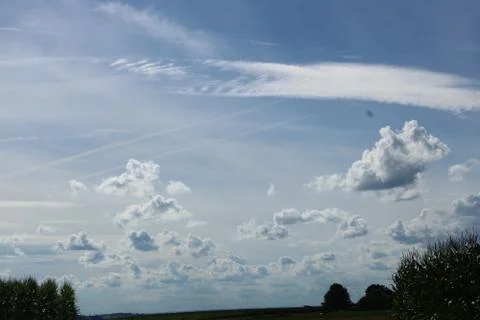 Cloudscape over a field Stock Photos