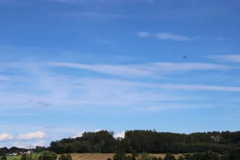 Cloudscape over forest. Stock Photos