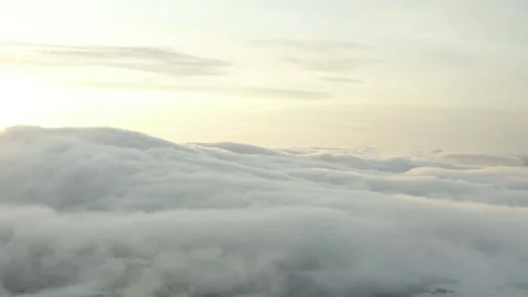 Cloudscape over mountain landscape at dawn Stock Footage 320304162