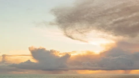 Cloudscape over the ocean with rain and storm clouds - timelapse Vídeos de archivo 220022271