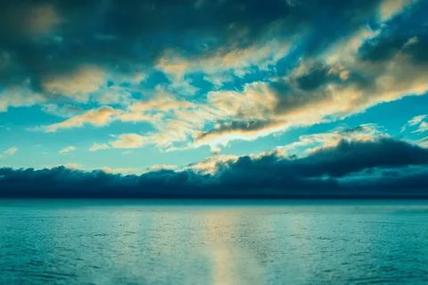 Cloudscape over the sea Stock Photos