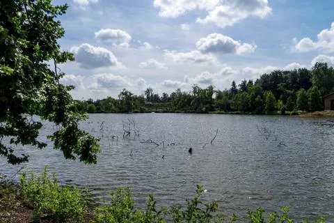 Cloudscape of a peaceful lake Stock Photos