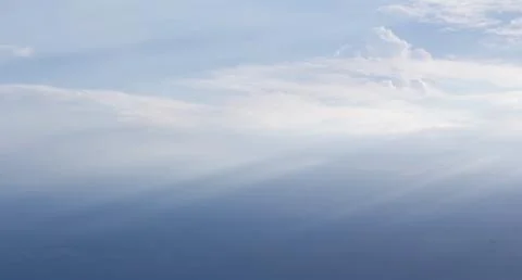 Cloudscape of sky and the light of the sun shines a beam. Stock Photos