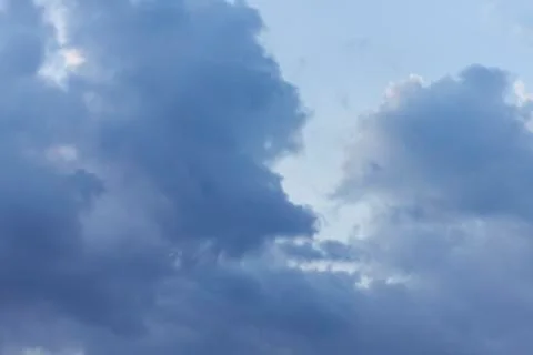 Cloudscape, Sky with clouds and sunlight at sunset. colorful and cheerful, wa Stock Photos