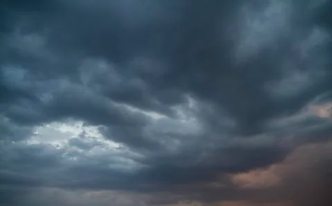 Cloudscape, Sky with clouds and sunlight at sunset. colorful and cheerful, wa Stock Photos