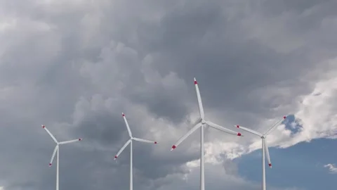 Cloudscape sky with wind farm turbine background Stock Footage 334814490