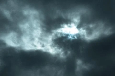 Cloudscape, with the sun in the background Stock Photos