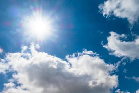 Cloudscape with the sun Stock Photos