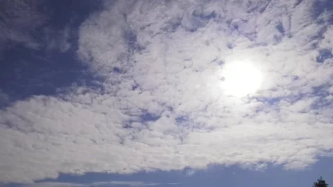 Cloudscape, sun rays, blue sky. Stock Footage 100159997